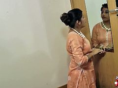 Chubby indian teen toying in standing position