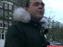 These guys were looking for hookers in Amsterdam. One of them found one that he liked. She sucked on his cock and stroke it until he came. He rimmed her afterwards.