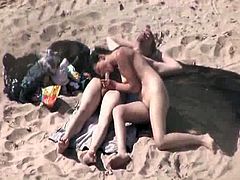 Couple on the beach fucks