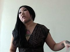 These sexy bitches lover showing off their ink for the camera. The tattoos look really good on their nubile and sexy bodies. The Asian slut lifts up her top and reveals what she has underneath. She is such a dirty and bad girl!