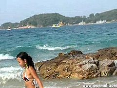 Watch this hot bombshell babe in bikini, running around the beach and enjoying this nice surroundings. See her tight body, as she is showing it to you with very tease-full attitude and making you crave her more. That tight bubble butt is sure something to dream about all night long!