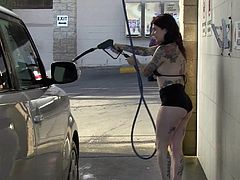 Joanna Angel wears very little while washing her car