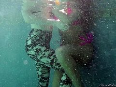 When these two amazing looking lesbians get in the water together, they get really horny. The elegant lesbians kiss each other and make out like dirty sluts in the water. They take off their bikinis and press up close to one another.