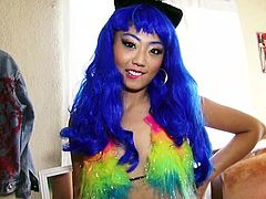 Miko's Asian charming features and open attitude make her extremely hot. She wears a blue wig, a colorful bra and makeup. The horny lady is craving for a hard cock to stuff in her lusty pussy. The bitch loves riding dick and sucking seems to be her hidden talent. Watch Miko banged sideways.