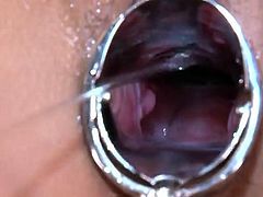 Speculum play puts you inside her Asian pussy