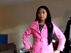 Asian in pink PVC coat and black leather pants