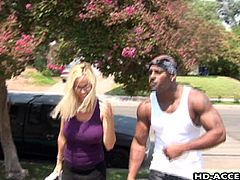Blonde MILF with superb boobs meets a homie, who is very eager to check out Tabitha's jiggly boobs and sexy thighs. As she takes out her astonishing tits, black dude gets a big boner and Tabitha starts sucking it happily. Guy also gets to fuck those stunning tits, before MILF begins to ride on!