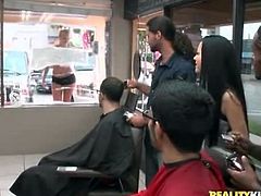 Blonde flashes her tits to the barber shop