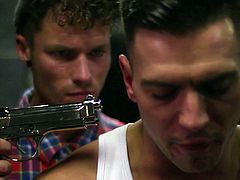 When the British lads go wild, be sure that they are unstoppable! Like in the movies with mafia, the naughty boys threaten each other with a gun. Hopefully, nobody gets hurt, as the laws of the attraction work in mysterious ways... See the guys undress. Tattooed Mckensie is just dying to suck Paddy's dick.