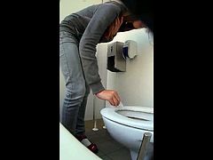 Cute Girl Exposes Nice Ass and Sits Down on the Toilet