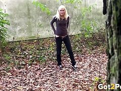 Blond haired bitchy chick loves pissing on leaves in the forest