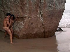 Busty Claudia Bella gets every hole drilled on the beach