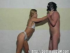 Masked dude being abused by a blonde bikini bombshell