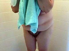 drying her hairy bush & big tittys after shower