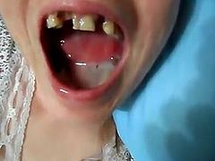 Gap toothed hillbilly slut taking a mouthful of cum