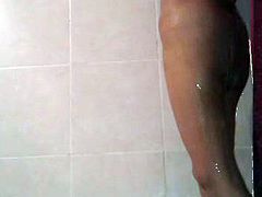 Latin mature taking shower