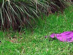 Horny Melissa has no clue that a man followed her and continues to watch her every move, enjoying the kinky way she's playing with her cunt, while laying on the grass, legs widely spread. Click to see what this naughty lady is up to, when she spots the daring stalker!