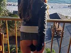 Dildoing On Resort Balcony