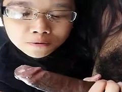 Asian girl sucks BBC and Swallows his cum