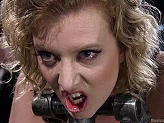 Slutty Cherry has become a dirty slave, who has to obey every wish of her executor's. The dominant guy persuades her into sucking a dildo, which he eventually is going to stuff in her appetizing cunt. Watch the naughty blonde restrained and tortured!