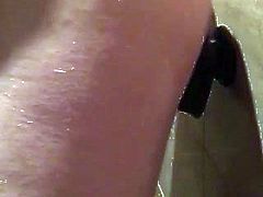 Fucking my ass in the shower with a big black dildo