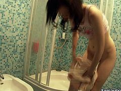 Russian nympho Irina takes a shower before having sex