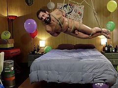 Wrapped in a festive package, made of sturdy ropes and decorated with balloons, completely naked, Dj meets his birthday in unexpected way, hanging from the ceiling in the middle of the room. Fortunately, his best friend has not forgotten about this day and came to please him...