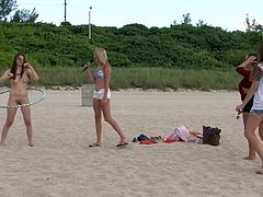 The group of sexy and fuckable babes are having a very good time down at the beach. Enjoy the sun and have some fun with the hula hoop. Even better - do it naked! They are rewarded with cash for the public nudity.