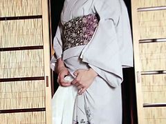 Japanese geisha shemale takes off her kimono and jacks off