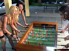 Four trannies enjoyed their table football game and after spending enough time on cock blowing, balls wetting and wet ass exploration, it was time for some serious and extreme anal fucking...