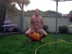 Naked on space hopper