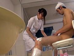 This slender nurse was determined to wash her patient's body, to refresh him a little, but things got out of control. Watch her jerking patient's dick and massaging his balls, on knees, with great passion. Have fun and enjoy the spicy details.