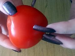 slicing tomato with nails