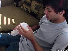 In this solo scene, 19 year old Remy LeBeau finds a Fleshjack masturbation sex toy on the coffee table and decides to give it a test drive on his big 8 inch cock. This cute and seductive Latin boy puts the toy through its paces and ends up shooting a big load of warm cum.