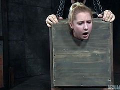 Slut in a bondage box fucked by big dicks