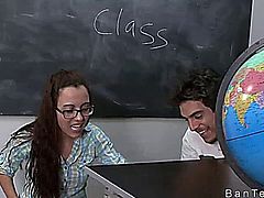 Busty teacher helps couple in handjob in classroom