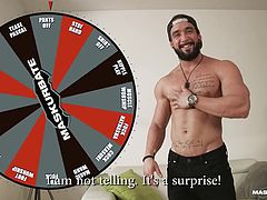 Spin the wheel and see what happens you sexy, hairy hunk. Wouldn't you just love to lick his muscles? He landed on the square that says he had to uses a penis pump, to masturbate. Look at how hard he is now.