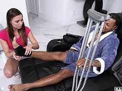 She was tired of small cocks, so that's why she stopped dating white guys and moved on to black guys. This beauty was taking care of her black stud, by rubbing his feet and sucking on his gigantic penis. He was injured so she had to help him feel better.