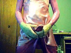 crossdresser masturbates hard in shiny metallic pink satin