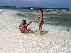 Claudia Adams seduced by a hunk for a fuck on a beach