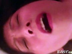 Chinese MILF filmed fucking herself with a dildo