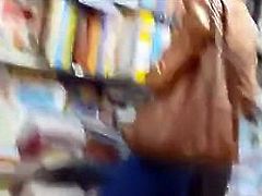 Book shop flasher close to girl