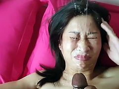 Asian girl blows her man and gets her face sprayed