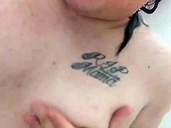 Chunky tranny washes her tits