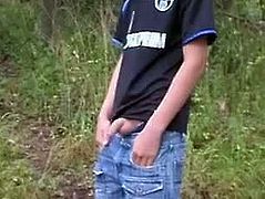 boy piss in the forest