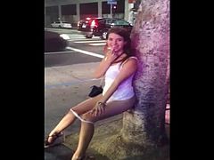 pretty teen piss in the street in front of passersby