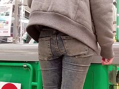 Young redhead MILF with round ass in jeans