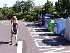 Asian babe with short dress pees outdoor near waste sorting