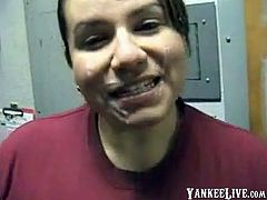 A horny brunette gives head in her full clothes and she makes the man cum on her face and mouth.