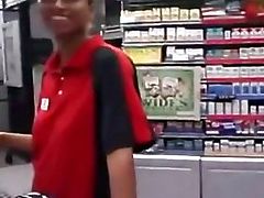 Ebony sales clerk sucks a customer in the stockroom
